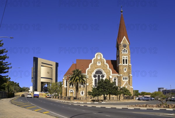 Evangelical Lutheran Christ Church from 1910, in the background the Independence Museum, Windhoek, Khomas region, Namibia