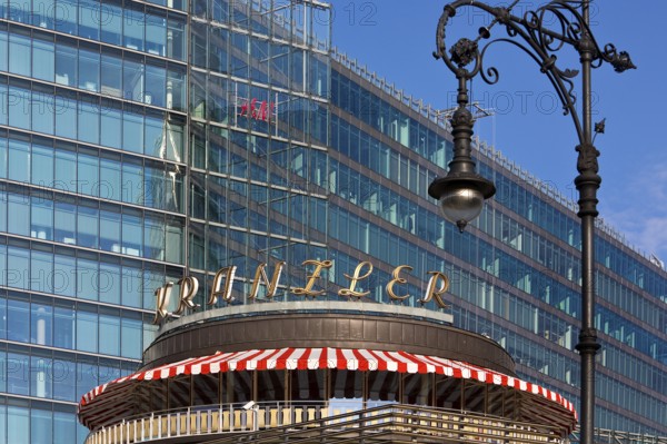 Café Kranzler with historic lantern and modern office building on Kurfürstendamm, Charlottenburg, Berlin, Germany