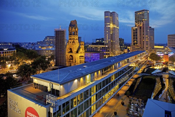 Bikini Berlin with Kaiser Wilhelm Memorial Church from an elevated position in the evening, Charlottenburg, Berlin, Germany