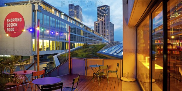 Bikini Berlin with the Upper West Tower in the background in the evening, Charlottenburg, Berlin, Germany
