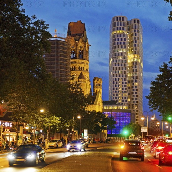 Budapester Straße with Kaiser Wilhelm Memorial Church and Upper West Tower in the evening, Charlottenburg, Berlin, Germany