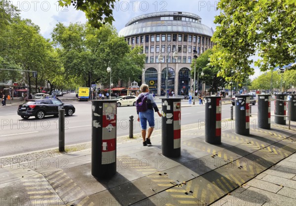 The podium of the Kaiser Wilhelm Memorial Church is secured from vehicle barriers due to the attack in 2016, Kurfürstendamm, Berlin, Germany