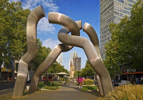 The sculpture entitled Berlin by Brigitte and Martin Matschinsky-Denninghoff with Kaiser Wilhelm Memorial Church, Charlottenburg, West Berlin, Berlin, Germany