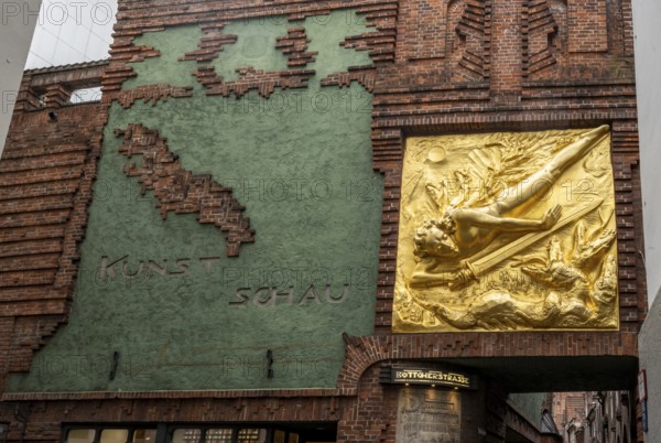 Entrance to Böttcherstraße, golden relief, façade relief The Light Bringer by Roland Hötger, Old Town, Bremen, Germany