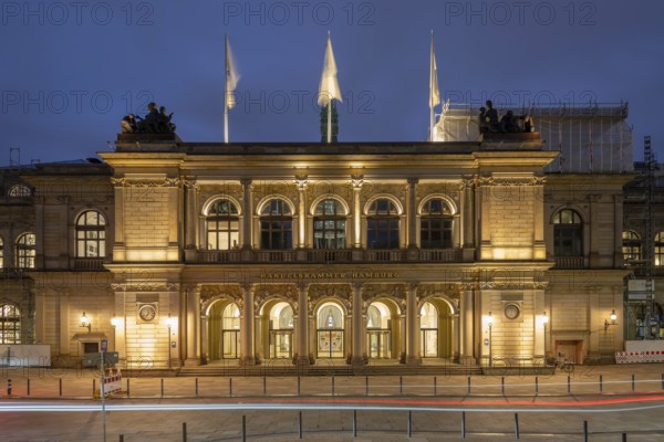 Building of the Hamburg Chamber of Commerce at blue hour with a strip of light in the foreground, Hamburg, Germany