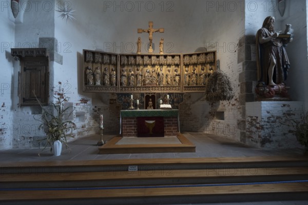 Carved altar in St John's Church, Nieblum, Föhr Island, Schleswig-Holstein, Germany