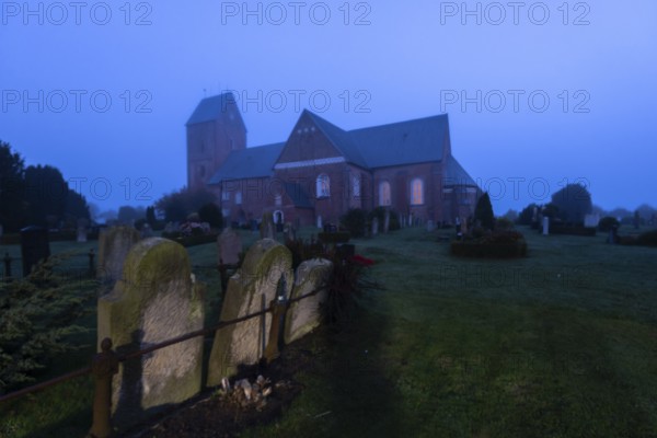 St John's Church in the morning mist, also known as Friesendom, Nieblum, Föhr Island, Schleswig-Holstein, Germany
