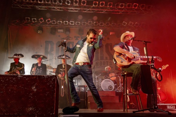 Alec Völkel (Boss Burns) and Sascha Vollmer (Hoss Power), singer of the band The BossHoss on their Back To The Boots Tour 2025 at Capitol Hannover on 3 October 2025