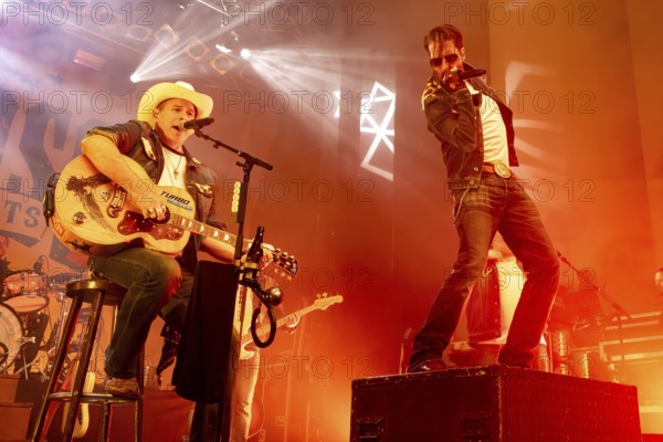 Sascha Vollmer (Hoss Power) and Alec Völkel (Boss Burns), singer of the band The BossHoss on their Back To The Boots Tour 2025 at Capitol Hannover on 3 October 2025