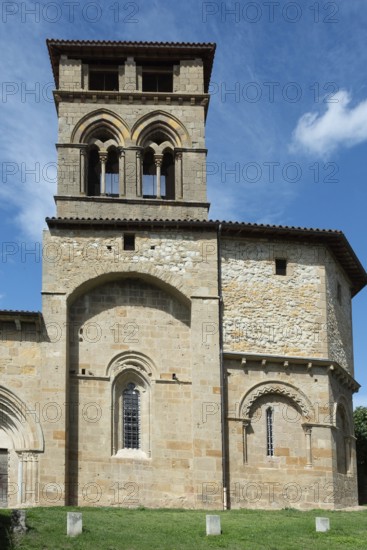 Mailhat village. Romanesque church with its square bell tower, Puy de Dome department, Auvergne-Rhone-Alpes, France
