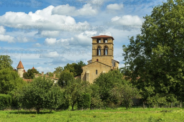 Mailhat village. Romanesque church with its square bell tower, Puy de Dome department, Auvergne-Rhone-Alpes, France