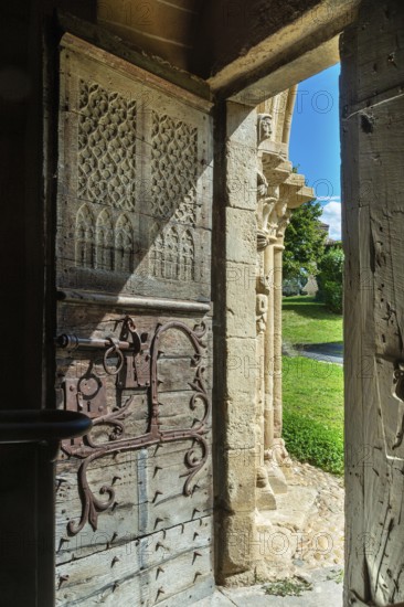 Entrance door of the romanesque church of Mailhat, Puy de Dome department, Auvergne-Rhone-Alpes, France