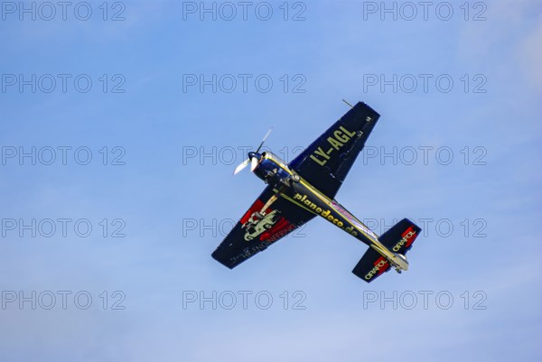 A Jakovlev Jak-55 with the registration LY-AGL during a flight demonstration as part of an air show at the Rossfeld in Metzingen-Glems, Baden-Württemberg, Germany, for editorial use only