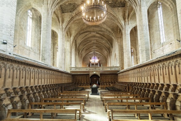 Choir stalls and Pope Clement VI tomb Saint Robert Abbey, La Chaise Dieu, Haute Loire, Auvergne Rhone Alpes, France
