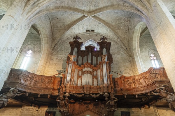 Organ loft of Saint Robert abbey. La Chaise Dieu. Haute Loire department. Auvergne-Rhone-Alpes, France