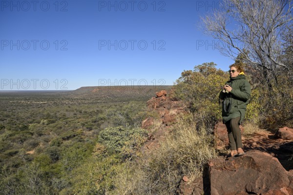 Tourist enjoying the view from Waterberg, Otjozondjupa region, Namibia