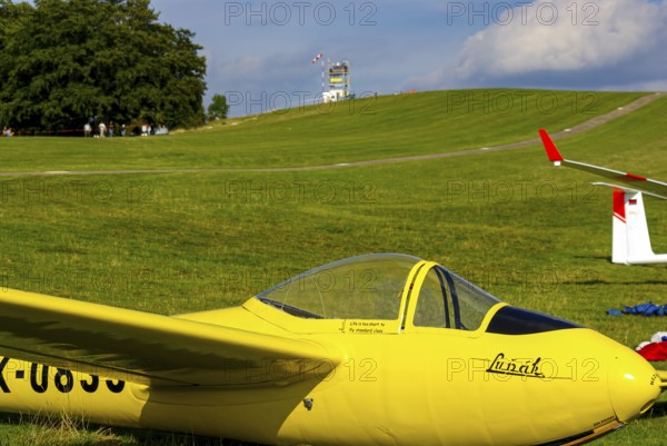 A Letov LF-107 Lunak glider with the registration OK-0833 parked at the edge of the airfield during an air show at Rossfeld in Metzingen-Glems, Baden-Württemberg, Germany, for editorial use only