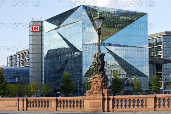 Historic Moltkebrücke with modern Cube Berlin, cube-shaped office building with glass façade reflecting the surroundings, Berlin, Germany
