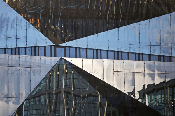 Cube Berlin, cube-shaped office building with folded glass façade reflecting the surroundings, detail, Washingtonplatz, Berlin, Germany