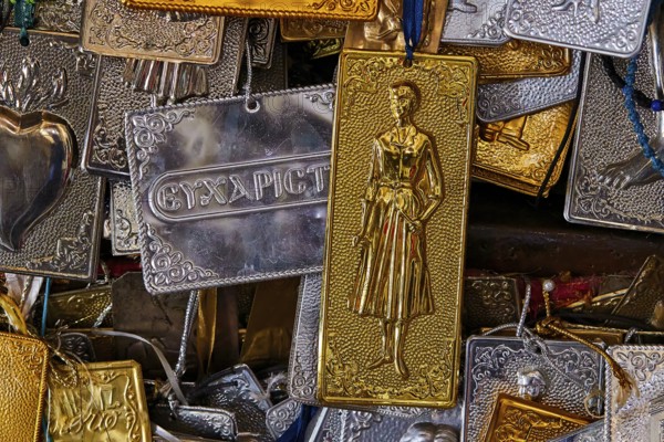Pantanassa Monastery from the 15th century AD, votive tablets, stacked metal plaques with engravings of woman in antique style, Mystras, Mistra, UNESCO World Heritage Site, medieval Byzantine ruined city, northwest of Sparta, foothills of the Taygetos Mountains, Peloponnese, peninsula, Greece