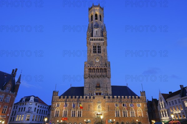 Illuminated Belfry in the historic city centre of Bruges in the evening light, Belfort and City Halls, City Halls at the Grote Markt, Market Square, UNESCO World Heritage Site, Bruges, Flanders, Belgium