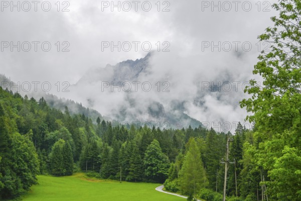 Fog shrouded Kamnik-Savinja Alps, Zgornje Jezersko, Slovenia