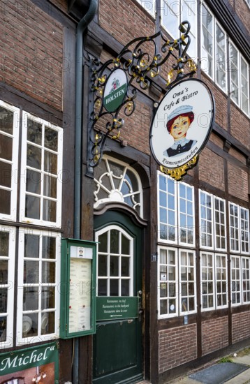 Nose sign and entrance to Oma's Cafe and Bistro in the Krameramtsstuben, historic building, Krayenkamp, Neustadt, Hamburg