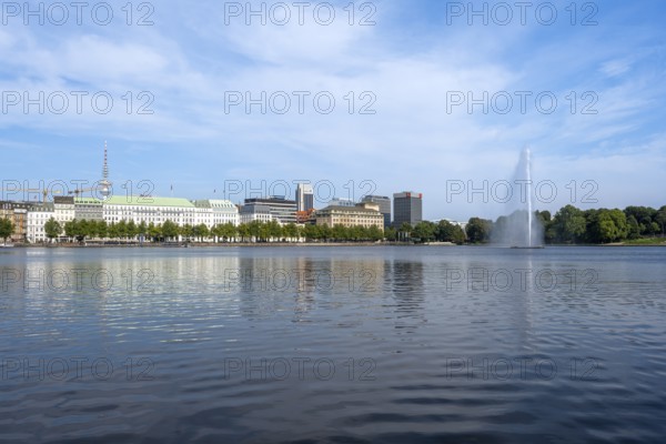 View over the Inner Alster with Alster fountain and television tower, Hamburg, Germany