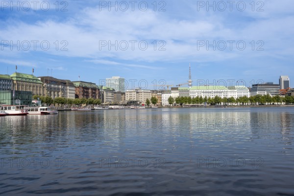 View over the Inner Alster to prestigious office blocks, hotels and commercial buildings and television tower, Hamburg, Germany