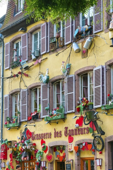 Decorated historic half-timbered house in the old town centre of Colmar, France