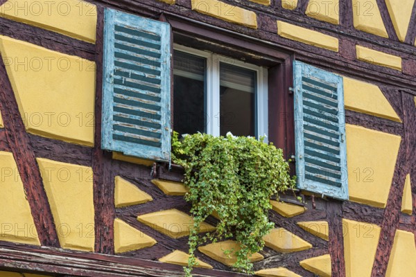 Window of a historic factory building, Colmar, France