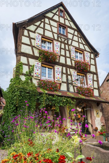 Decorated half-timbered house in the old town centre of Kaysersberg