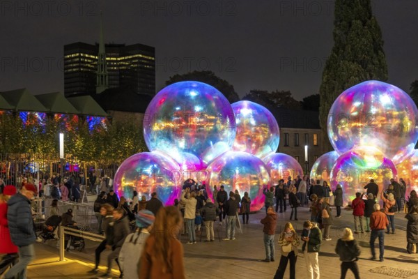 The 10th Essen Light Festival, in the city centre, second largest light art festival in Germany, light art on the Burgplatz, Evanescent light installation, by the Australian artist duo Atelier Sisu, large bubble-like spheres, with light and sound, town hall, cathedral, Essen, North Rhine-Westphalia, Germany