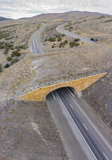 Wells, Nevada - A wildlife overpass on Interstate 80 east of Wells allows elk, deer, mountain lions and other animals to safety cross the freeway, reducing collisions with vehicles
