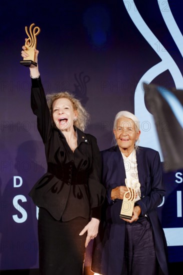Sunnyi Melles with the German Acting Award 2025 for the category Comedic Role in Die Zweiflers and Hildegard Schmahl with the German Acting Award 2025 in the category Honorary Lifetime Achievement Award on stage after the German Acting Award ceremony at Pullmann Berlin Schweizerhof, Berlin, 09.10.2025