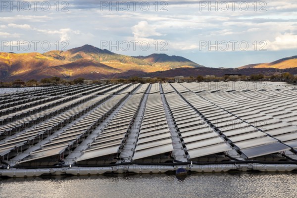 Park City, Utah - Floating solar panels provide power for Mountain Regional Water. The solar array is on the raw water storage pond at the water utility's Signal Hill Treatment Plant