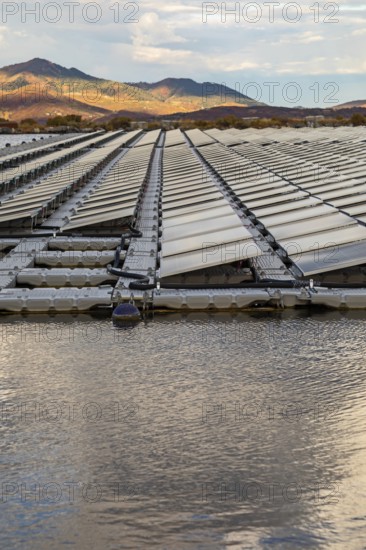 Park City, Utah - Floating solar panels provide power for Mountain Regional Water. The solar array is on the raw water storage pond at the water utility's Signal Hill Treatment Plant