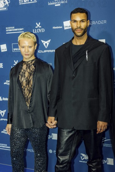 Eliob Demofike with partner Myat on the red carpet in front of the award ceremony at the Pullmann Berlin Schweizerhof, Berlin, 09.10.2025