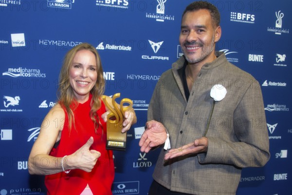 Anneke Kim Sarnau and Michael Klammer present the award for Haley Louise Jones as best actress in a dramatic supporting role, DEUTSCHER SCHAUSPIELPREIS 2025, Red Carpet at PULLMAN BERLIN SCHWEIZERHOF, Berlin, 09.10.2025