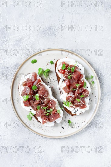 Sandwiches, rye bread with cream cheese, sliced tuna fillet with herbs, breakfast, homemade