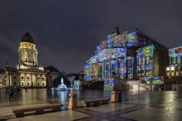Concert hall Berlin, Gendarmenmarkt, art action The Hands of Berlin, . BERLIN FESTIVAL OF LIGHTS, motto Let's Shine Together, light installations, 8 October 2025, Berlin, Germany, opening day in drizzle < english> 21st BERLIN FESTIVAL OF LIGHTS, motto Let's Shine Together, light installations, October 8, 2025, Berlin, Germany