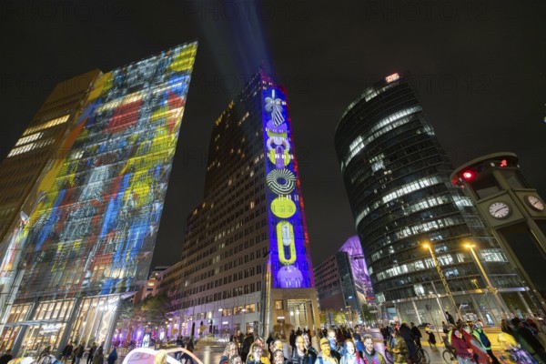 Potsdamer Platz, 21st BERLIN FESTIVAL OF LIGHTS, motto Let's Shine Together, light installations, 8 October 2025, Berlin, Germany, opening day in drizzle < english> 21st BERLIN FESTIVAL OF LIGHTS, motto Let's Shine Together, light installations, October 8, 2025, Berlin, Germany