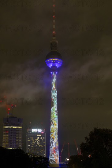 TV tower, 21st BERLIN FESTIVAL OF LIGHTS, motto Let's Shine Together, light installations, 8 October 2025, Berlin, Germany, opening day in drizzle < english> 21st BERLIN FESTIVAL OF LIGHTS, motto Let's Shine Together, light installations, October 8, 2025, Berlin, Germany