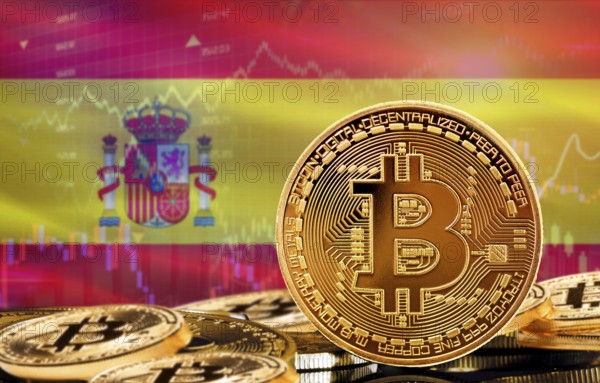 Investors in cryptocurrency and Blockchain Technology in Spain, Concept. Bitcoin with Spain flag in the background