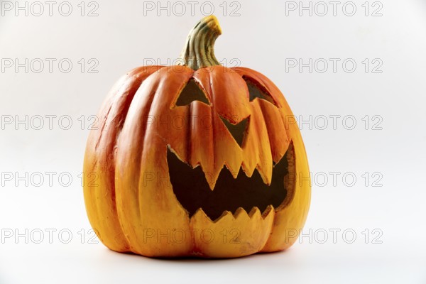 Scary orange pumpkin, Halloween, white background