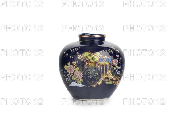 Dark blue Chinese vase with ornate decoration, white background