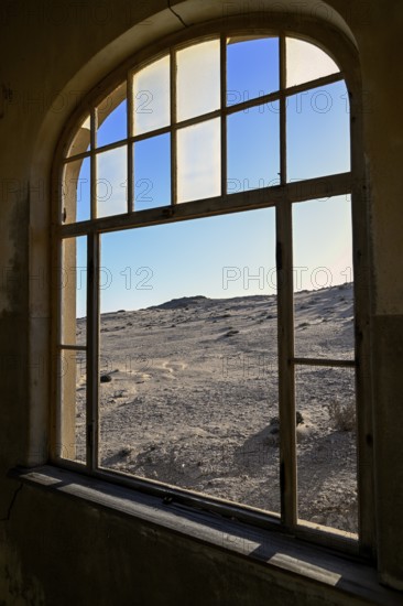 View from a former dwelling house into the desert, Kolmanskop, restricted diamond area, Karas region, Namibia