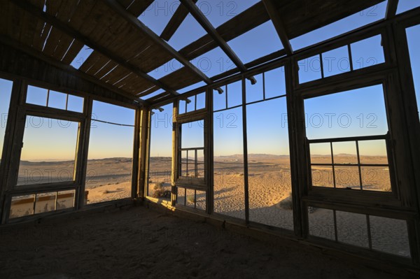 View from a former dwelling house into the desert, Kolmanskop, restricted diamond area, Karas region, Namibia
