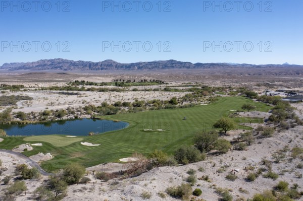 Coyote Ssprings - The Coyote Springs golf course in the Nevada desert. The Jack Nicklaus-designed course was originally to be surrounded by a planned community of 160, 000 homes. The golf course opened in 2006 but the homes were never built