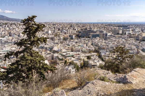 View from Philopappos Hill over the sea of houses in the Greek capital Athens, Greece